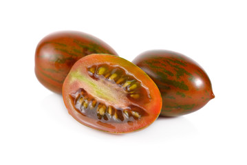 chocolate tomato, brown color tomato on white background