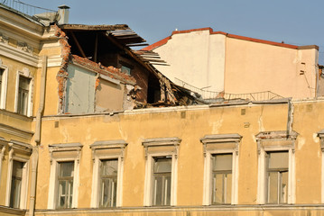 Fototapeta na wymiar Demolished old building in St. Petersburg, Russia