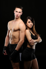 Fototapeta na wymiar Portrait of 2 young boxers, male and female