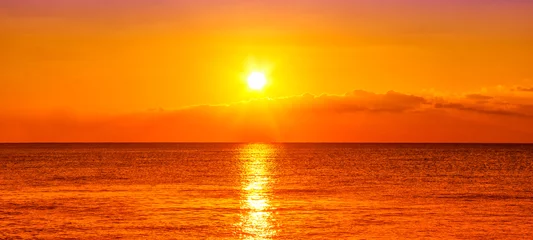 Tuinposter Zonsondergang aan zee Oceaan en zonsondergang