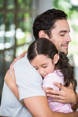 Fototapeta premium Daughter hugging father 