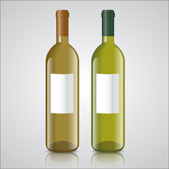 Three bottles of white and red wine with labels