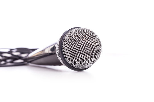 Close up old microphone isolated on white