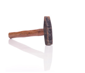 Old rusty hammer isolated on white background