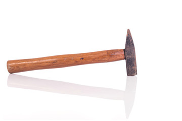 Old rusty hammer isolated on white background