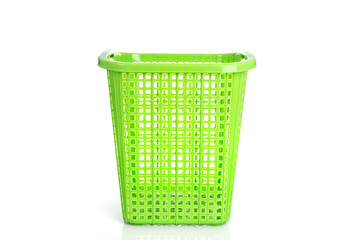 Empty new green plastic basket isolated on white