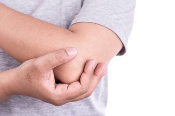 Close up woman's hand holding her elbow isolated on white. Elbow