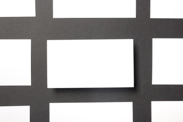 Business card blank over office table. Corporate stationery branding mock-up