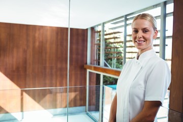 Portrait of smiling masseuse