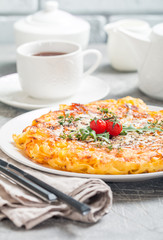 pasta casserole with eggs, sun-dried tomato and cheese