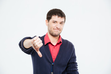 Naklejka premium Sad man showing thumb down