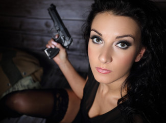 Pretty girl with a gun