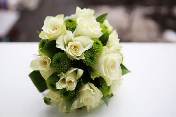 Beautiful wedding bouquet of white roses