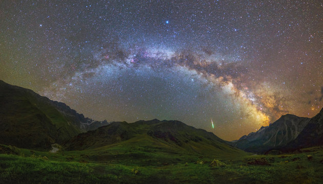 Milky Way arc over mountains