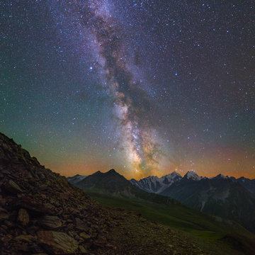 Milky Way and stars over mountains