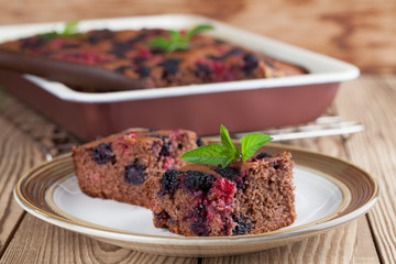 Gingerbread cake with mulberries and red currants