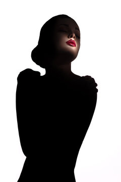 recommend clip art: Silhouette of a woman with red lipstick/  Silhouette of a sensual woman with red lipstick.  Isolated on white background. Studio shot of young beautiful woman.