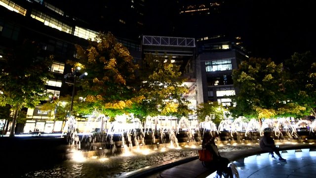 NEW YORK CITY -JUNE 2013: Columbus Circle fountain at night. New York attracts 50 million people annually