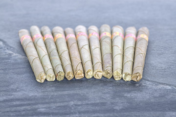 Picture of cheroots, Burmese cigars that are traditional in Burma and India, shallow depth of field.