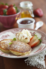 Pancakes with berries and ice cream