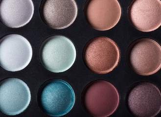Palette of colorful eye shadows.