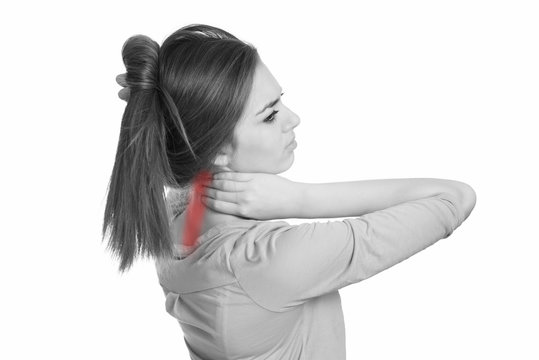 Neck pain. Young woman suffer from neck pain