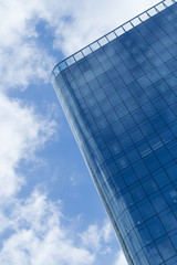 Skyscraper with glass facade. Modern building. Concepts of economics, financial, business  future. Copy space for text.