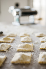 Making ravioli on a wooden table and tools