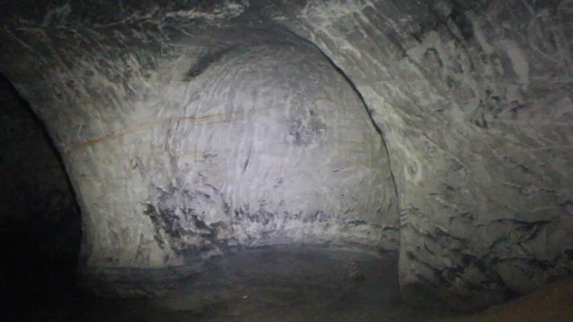 Dungeon prisoner wandering through underground maze
