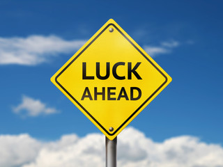 Luck ahead road sign