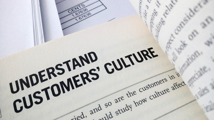 Obraz premium Understand customer culture word on the book