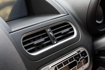 Obraz na płótnie Canvas Air conditioner in compact car