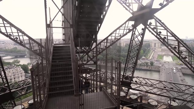 External elevator of Eiffel Tower with city view