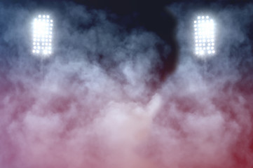 stadium lights and smoke