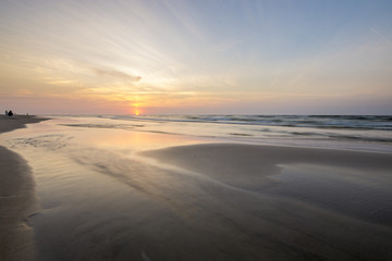Fototapeta na wymiar sunset over the sea beach 