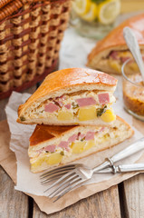 Two Pieces of Potato, Ham, Sour Cream and Cheese Pie