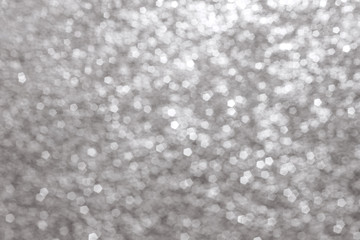 abstract silver bokeh background.
