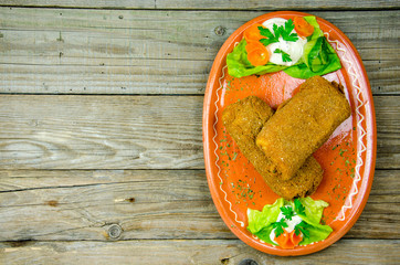 fried pancake on a clay plate