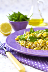 Quinoa salad with spinach and sweet corn.