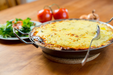 baked quiche with field salad