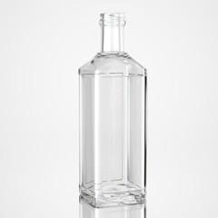 Glass bottle on white background