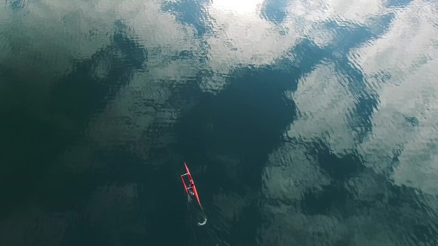 Sea kayaker filmed from above 