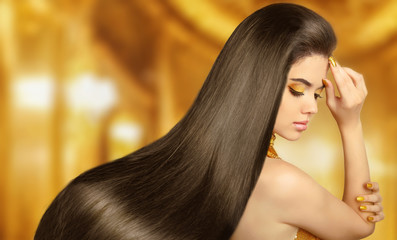 Beautiful Hair. Beauty brunette woman with luxurious long hair o
