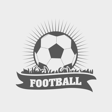 Football or soccer emblem, logo or label design template with ball on grass