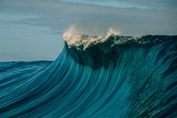 Wave crashing over reef, Tahiti, French Polynesia