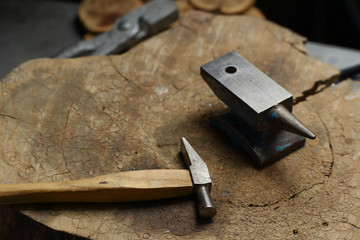 Tools of jewellery. Jewelry workplace on wooden background.