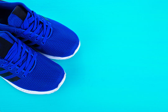 Blue Sport shoes. Running shoes on blue background
