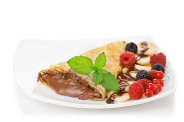 Crepes with chocolate cream and banana