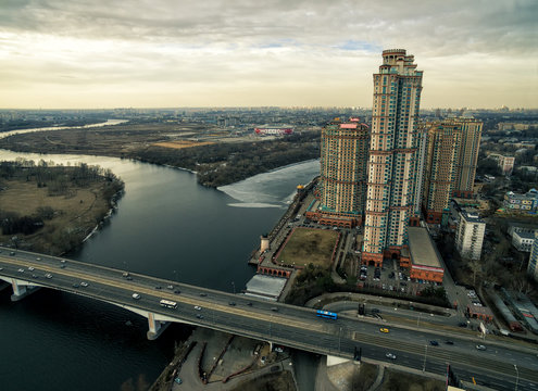 Aerial view of Moscow at sunset, Stroginsky bridge over Moskva river and residential tall buildings