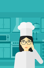 Chef pointing forefinger up.